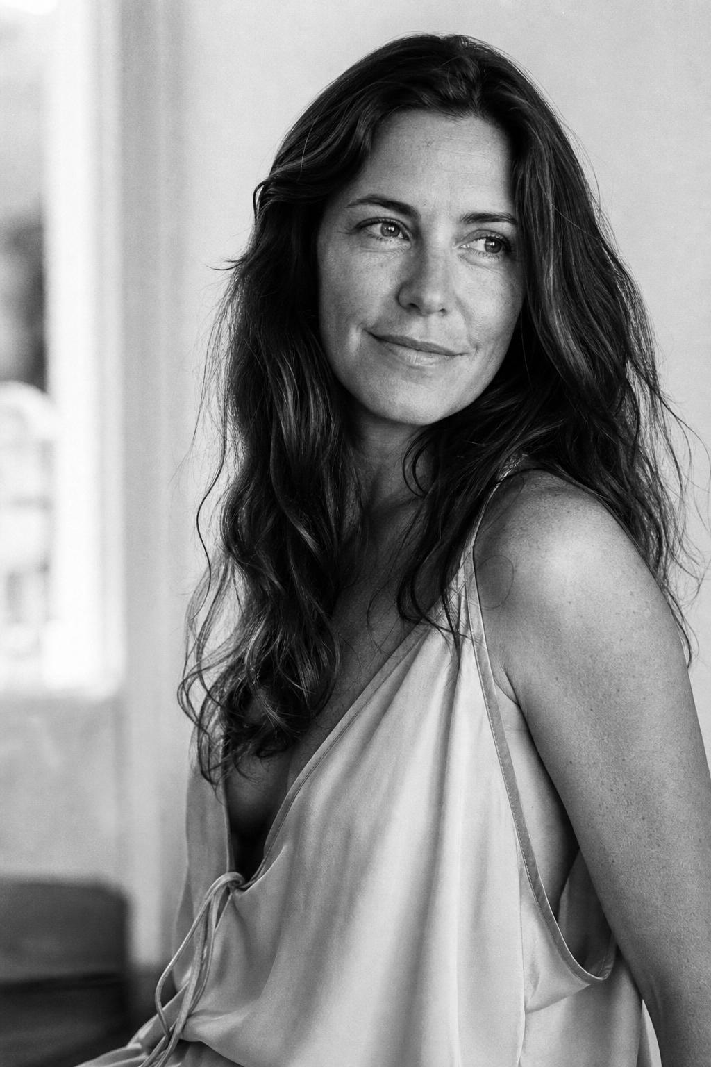 Portrait of a composed woman with natural, healthy skin
